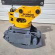 Yellow rotator and gray grapple, front three-quarter view, labeled ALSERG08 fit CAT307/308 with serial plate