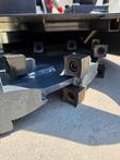Mini disc mulcher, close-up of bolt-on carbide teeth around the cutting disc edge