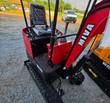 Miva VA13 mini excavator operator platform with seat, two joystick levers, checkered footplate and rubber track