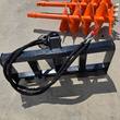 Raytree auger's skid steer quick-attach plate with hydraulic motor and hoses