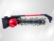Raytree RMT48 trencher, red spoil auger beside the digging chain, gold cup teeth and red crumber bar