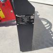 Raytree RMH680 hydraulic hammer data plate showing 315 kg gross weight, on the black mount side plate