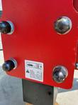Post driver mounting plate corner, bolts and grease-interval warning label