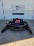 72-inch skid steer brush cutter, front view: curved push bar, red motor housing and angled side skids