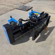 Raytree soil conditioner rear side, universal skid steer quick-attach plate, hydraulic motor and hoses on the drum