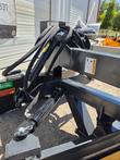 Grader blade tilt cylinders and pivot frame, Raytree stickers on the mount brackets