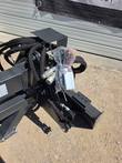Grader blade quick-connect couplers and bagged electrical connector on the mount