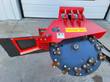 Raytree RTSG30 transverse stump grinder from above, red housing, springs, and toothed cutting disc
