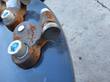 Tooth-holder mount bolted to the RTSG30's cutting disc, rusted from use
