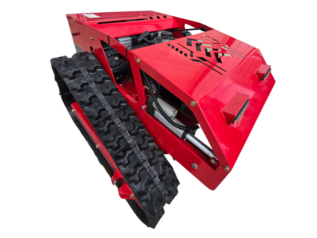 Red tracked remote control mower, front three-quarter view: vented steel hood, two front lights, rubber tracks