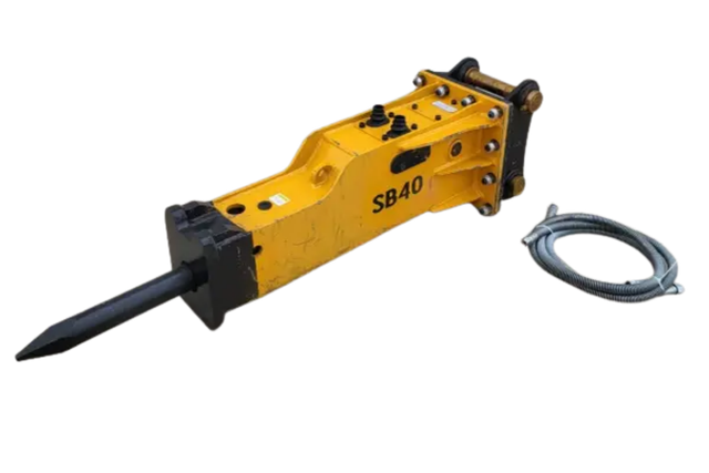SB40 hydraulic breaker, yellow body with pointed moil chisel, black mount bracket and brass pins, coiled hose pair