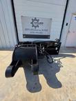 Black skid steer planer with milling drum, side depth wheels and quick-attach frame, front view
