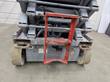 Skyjack SJIII 4632 base end, red entry ladder, gray scissor arms and non-marking tires