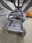 Skyjack SJIII 4632 chassis and scissor arms with platform raised, pothole guard and tires