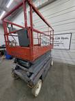 Skyjack SJIII 4632 stowed, three-quarter view of the platform end with guardrails, control box and scissor stack