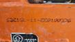 Stamped frame serial number S3215L-11-220100376 on the Snorkel scissor lift chassis