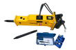 TOFT530 yellow hydraulic breaker lying flat with moil point, hoses and bracket, spare chisel, wrench and charge kit boxes