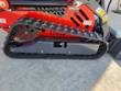Rubber track and drive sprocket on the Vorx NL360 mini skid steer undercarriage
