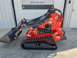 Vorx NL360 mini skid steer side profile, bucket lowered to the ground, rubber tracks and loader arm