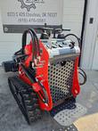 Vorx NL360 mini skid steer, stand-on tracked loader with joystick controls and bucket attachment
