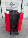 VORX NL750 operator platform, red flared side panels and black vinyl seat bolster