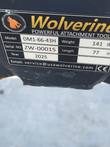 Wolverine data plate on the auger: model DM1-66-43H, serial ZW-00015, year 2025, 77 in length