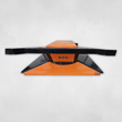 Black and orange brush cutter side view, wide black frame beam over the orange deck with ATS stencil