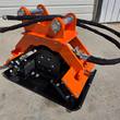 Wolverine E-VPC06 plate compactor, orange pin-on bracket, rubber isolator mounts and black baseplate