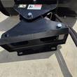 Mini skid steer quick-attach plate and pivot bracket on the back of the Wolverine M-DB43 dozer blade