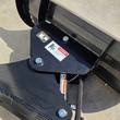 Wolverine M-DB43 dozer blade pivot bracket with hydraulic angle cylinder, pins and crush-hazard decal
