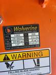 Wolverine S-EB35 data plate: 211.2 lbs, 600-800 bpm, 1.37 in drill rod, above a falling blade hazard warning label