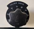 Round Caliber Choice dial on the induction sealer, scale marked from 40 upward
