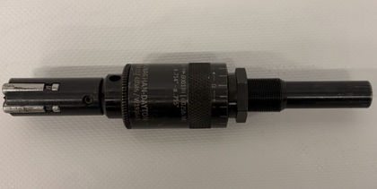 Monaghan-Dayton expanding reamer lying flat, with scale collar and slotted blade end, 0.714 to 0.755 inch