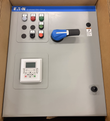 Closed gray Eaton Enclosed DG1 Drive door with keypad, indicator lights, pushbuttons and blue disconnect handle