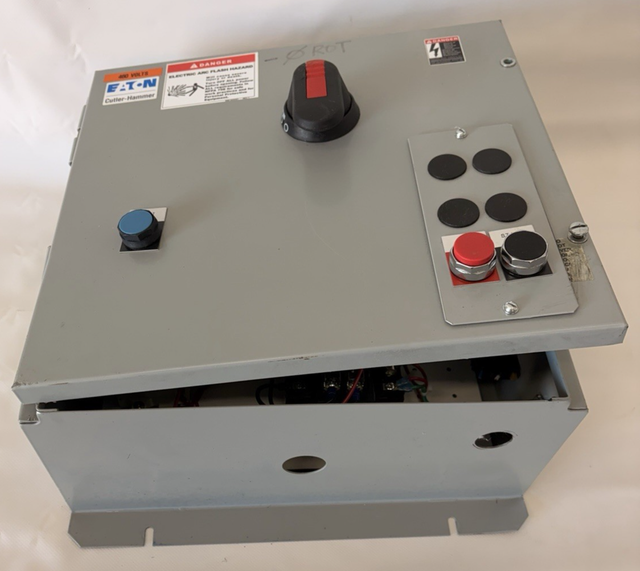 Eaton Cutler-Hammer 460-volt control enclosure, lid slightly raised, disconnect handle, reset and stop/start buttons