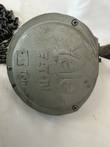 Round Yale hoist cover held by bolts, with the Yale name and a ton rating plate