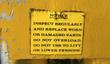 Yellow notice label: inspect regularly, replace worn parts, do not overload, do not lift or lower persons