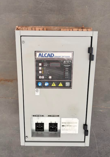 ALCAD AT10.1 battery charger cabinet, front with control panel and AC input and DC output breakers