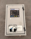 ALCAD AT10.1 charger front view, breakers wired shut with a seal cable and a label on the right
