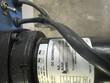 DC gearmotor nameplate on the shrink wrap machine, with wiring harness and toggle switch above