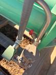 Asco valve housing and green solenoid coil below the green actuator cylinder, stainless tube above