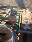 Namco Snap-Lock limit switch with red nameplate and conduit elbow on a green frame