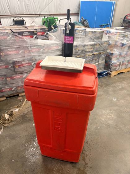 Red wheeled drink cart with black tap tower and white drip tray on top
