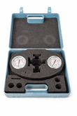 Open blue carrying case with two pressure gauges and cut-out black foam, on white