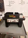 Kaivac OmniFlex battery box sitting on a gray cart