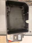 Top view into the empty battery cavity of the Kaivac OmniFlex box, hour meter along the bottom edge