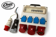 Brennenstuhl white distribution box with breaker panel, four blue sockets, three red CEE connectors and a loose plug