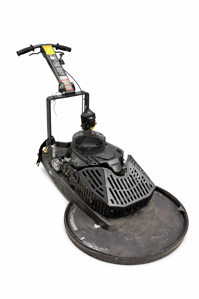 Black fan guard on a propane floor buffer engine