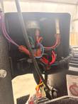Wiring inside the control box on a floor buffer handle: ignition switch, indicator light, red and blue leads
