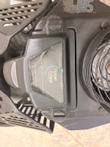 Worn Pioneer Eclipse logo label on the black engine cover, slotted guard and fan guard beside it